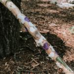 Try making this beautiful flower hiking stick with your child for your next nature walk!
