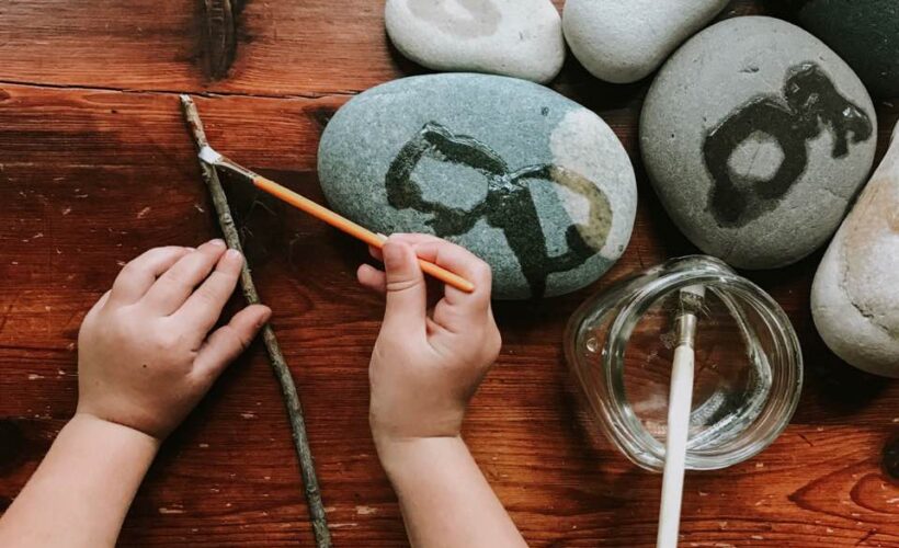 Try this simple activity to work on prewriting skills. Practice drawing straight lines on sticks and curved lines on stones with water and a paintbrush. Practice all over again once it dries!