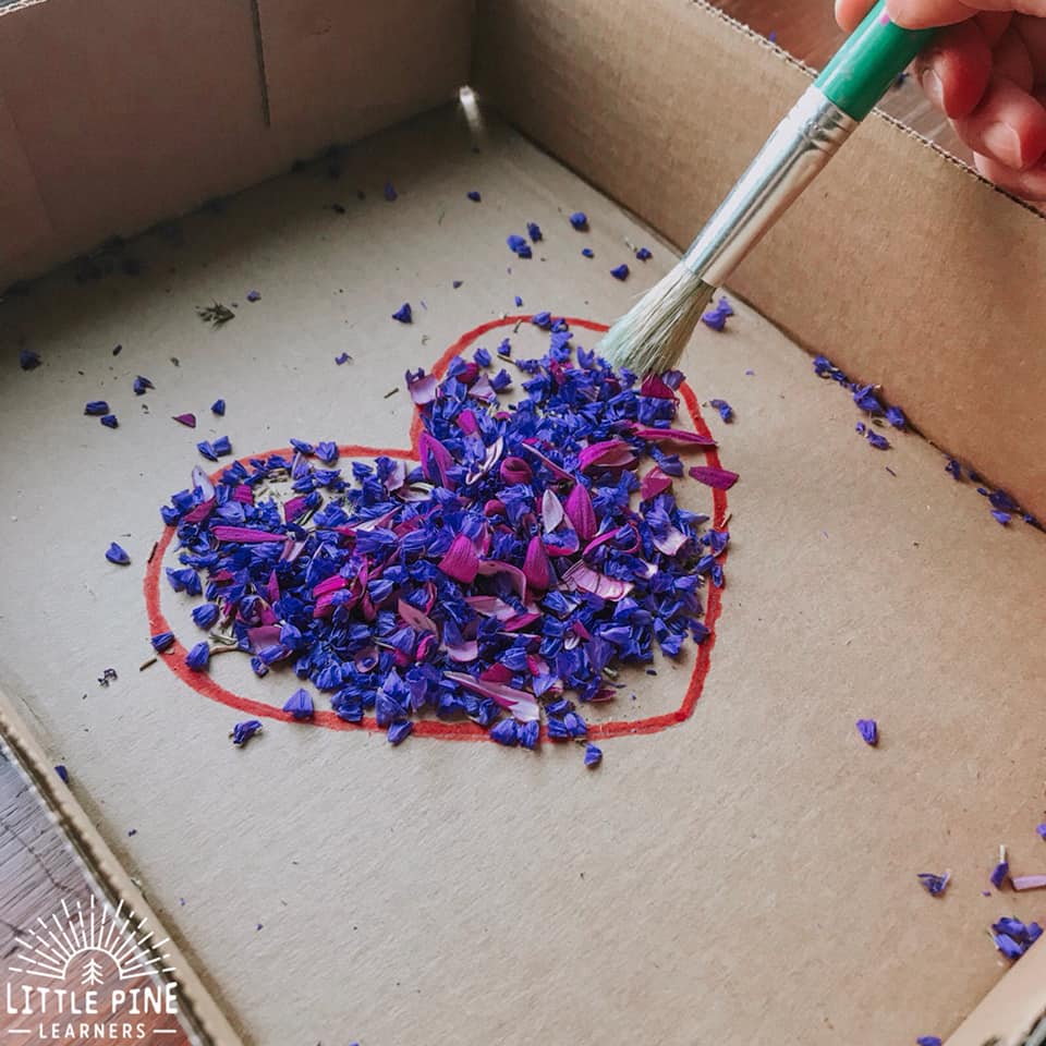 Here is a fun fine motor activity for preschoolers! This activity will give children the opportunity to work on hand-eye coordination, pencil grip, and other fine motor skills. You can use a bouquet of flowers if you're trying this activity for Valentine's Day or flowers from the garden if you are trying it during summer!