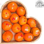 Try this adorable snactivity for Valentine's Day! These decorated cutie oranges are a great healthy alternative to the junk food and candy that kids pass out on Valentine's Day. Give this a try today! Kids will love to help make these sweet little gifts. 