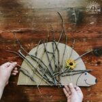 This stick weaving craft will be your new go-to outdoor activity for kids! It's easy to set up, kids can make the porcupine with you or independently, and you can reuse the weaving board over and over again! This is perfect for the homeschool or traditional classroom. It also makes a great remote learning suggestion for parents to try at home!