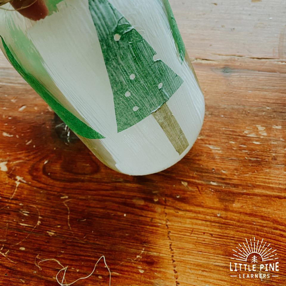 These pine tree lanterns make the perfect handmade Christmas gift or decoration for your home! They are so easy to make, inexpensive, and kids will love to help with the process.