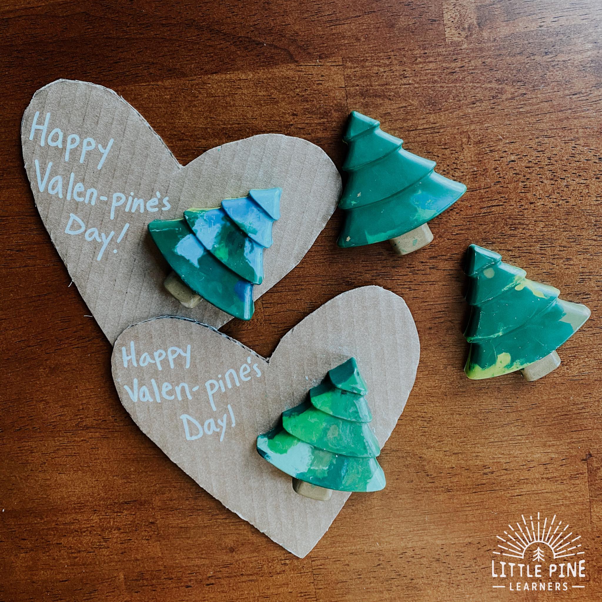 Cardboard hearts and crayon pine trees